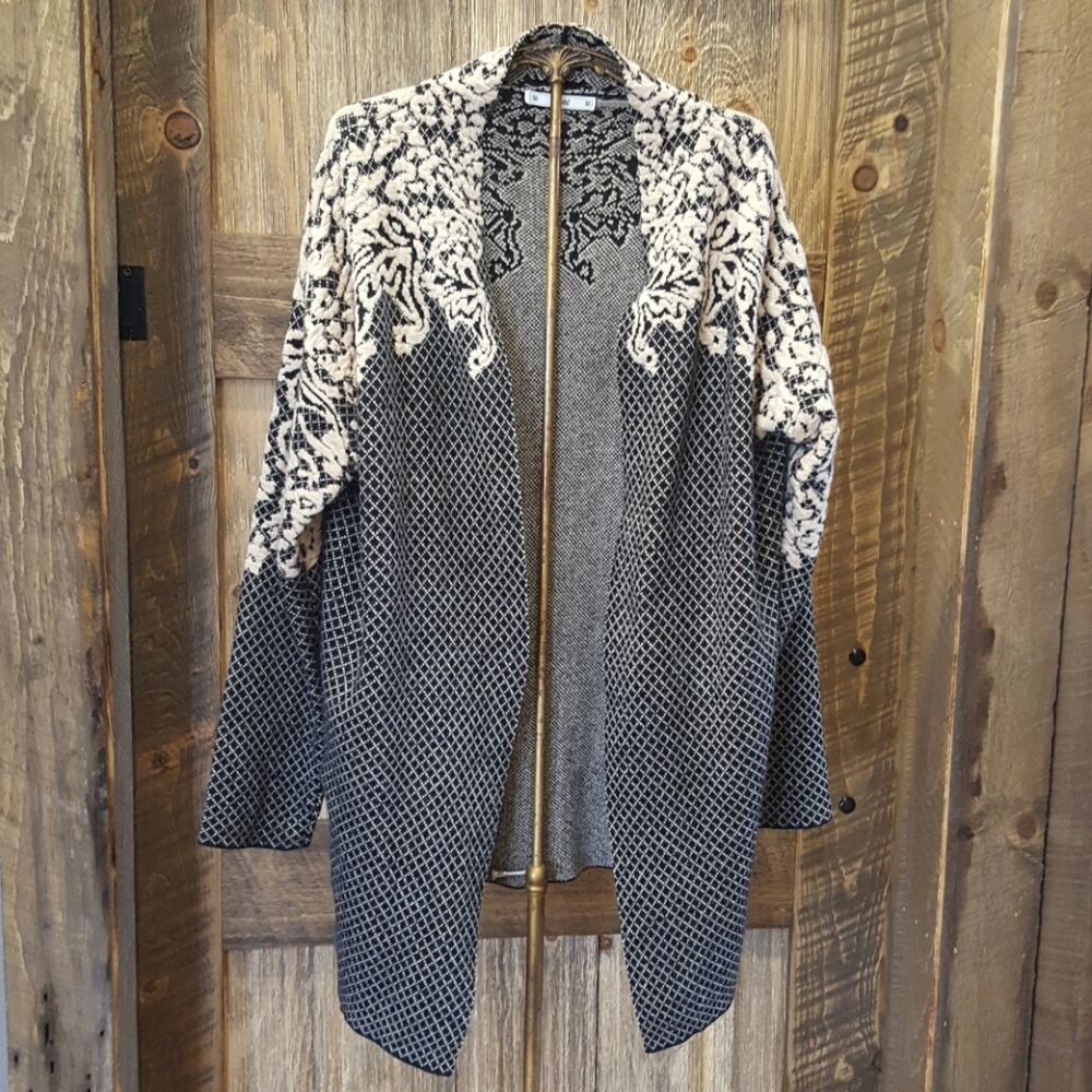 Black and cream cardigan size large it has wool an